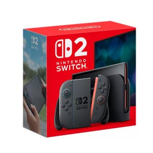 Box showing the \“Nintendo Switch 2,\“ featuring a gaming console with detachable controllers and a dock, in a compact, red packaging with the logo and a glimpse of the portable screen.