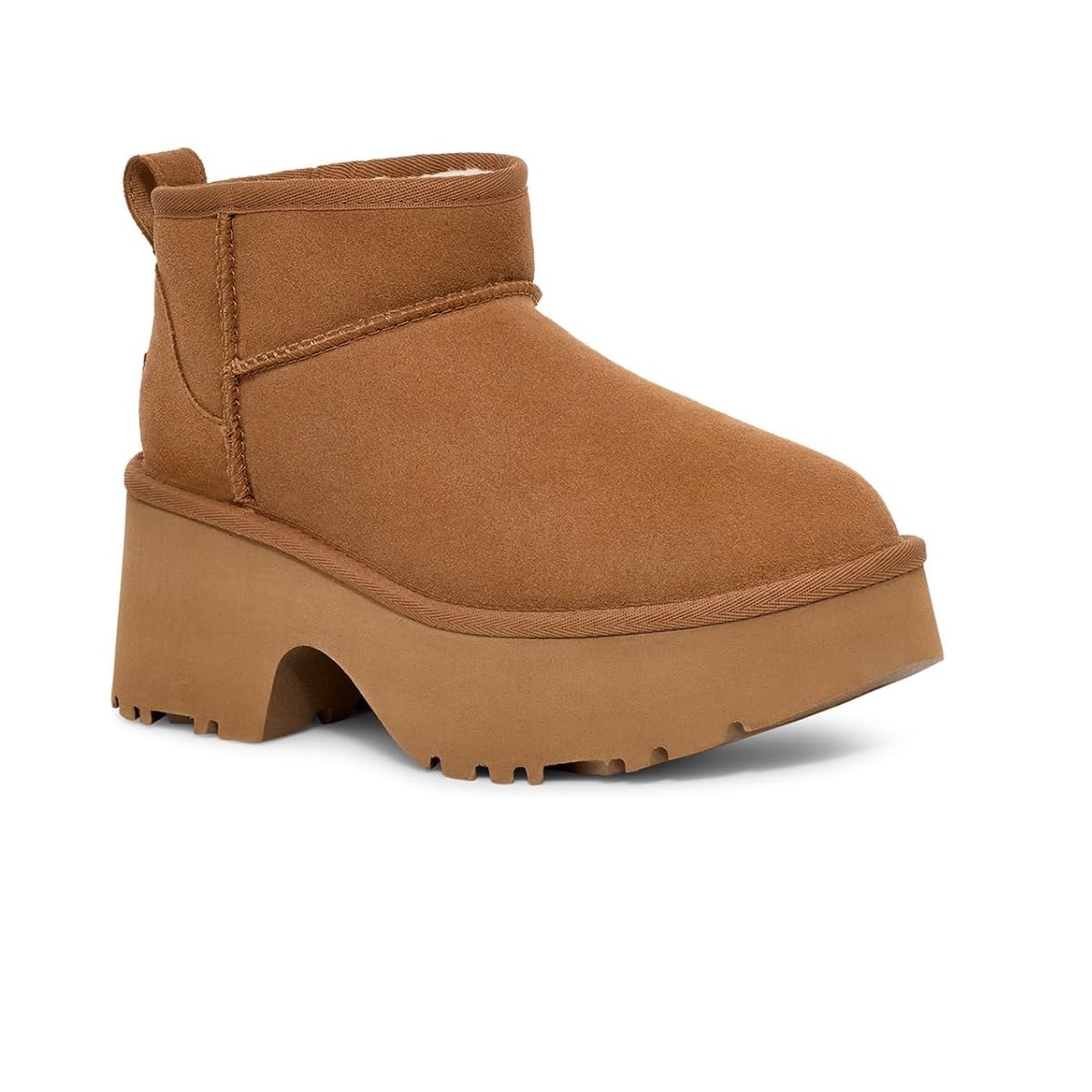 Platform ankle boot in brown, featuring a chunky sole and a pull tab at the back.