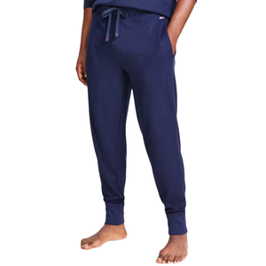Navy blue thermal joggers from Tommy Hilfiger, featuring a drawstring waist, side pockets, and ribbed cuffs, ideal for comfortable and casual wear.