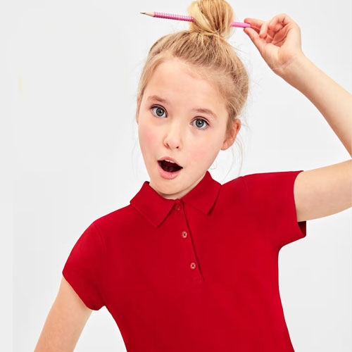 a girl wearing a red polo