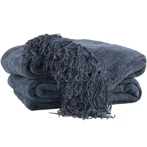 A folded dark blue throw blanket with textured fabric and fringe detailing.