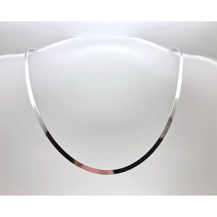 A minimalist 16-inch flat necklace featuring a smooth silver design with subtle gradient transitions from silver to black and a touch of rose gold.