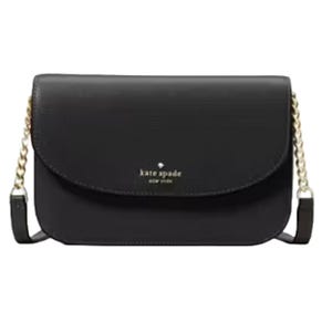 A black Kate Spade New York crossbody bag with a flap closure and chain shoulder strap detailing.