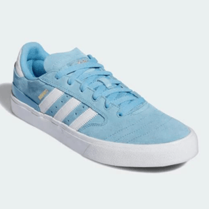 Light blue suede skateboarding-style shoe with white stripes and laces.
