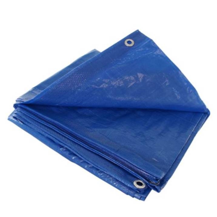 A folded blue tarp with metal grommets along the edges.