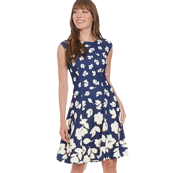 A sleeveless, navy fit and flare dress with a crew neckline, featuring a bold white floral print. The knee-length design is tailored at the waist, enhancing an elegant silhouette.