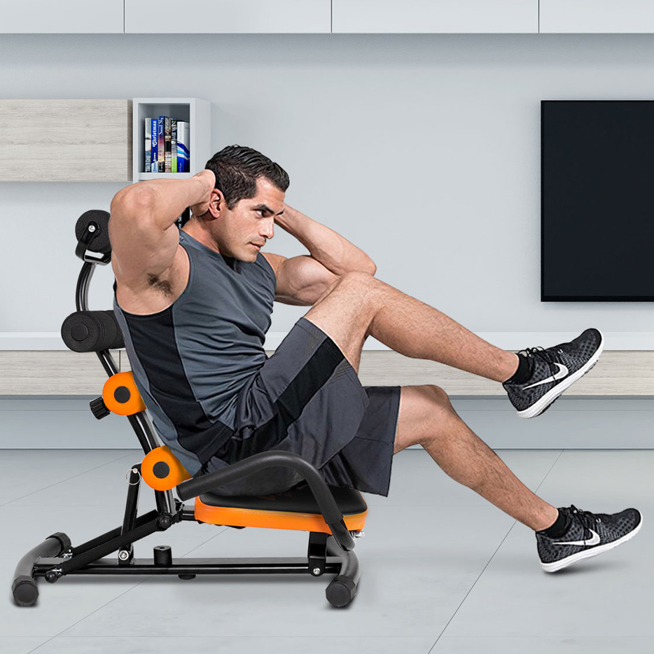 A man in athletic wear exercises using an adjustable sit-up bench designed for core workouts, featuring cushioned rollers and a sturdy frame.