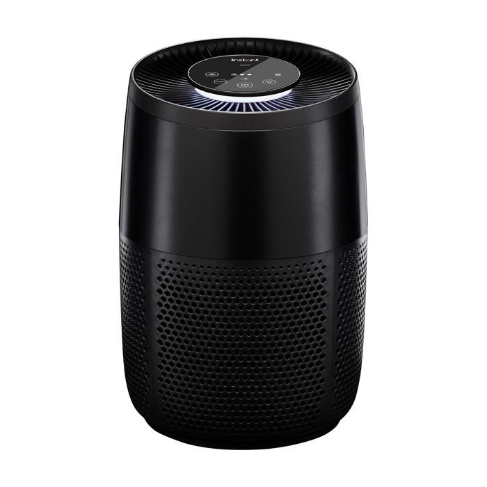A black cylindrical air purifier with a perforated design features a top control panel with touch-sensitive buttons and LED indicators.