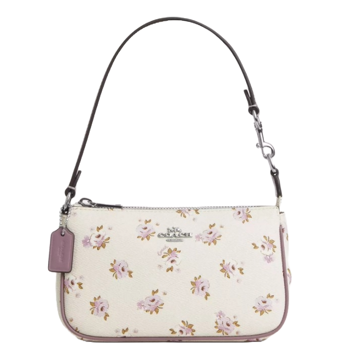 A white floral patterned shoulder bag with a detachable brown strap and a purple tag.
