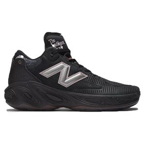 Black New Balance Fresh Foam sneakers featuring a distinctive N logo, textured black mesh upper with a unique wave pattern, and a cushioned, sculpted outsole designed for comfort and support.