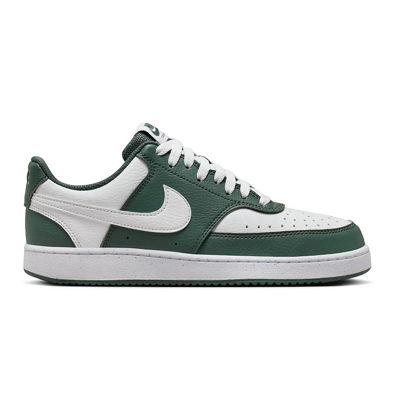 Nike sneaker, low-top design with white and green color scheme, featuring a white Nike swoosh logo on the side.