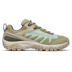Merrell hiking shoe with Vibram sole, featuring a light green and beige color scheme, designed for outdoor activities.