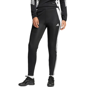 Black adidas track pants with white stripes and logo, paired with black sneakers.