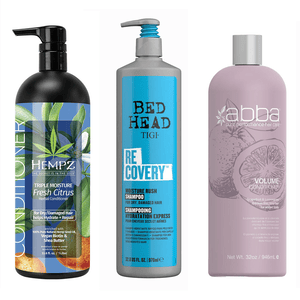 Three hair care bottles: HEMPZ Herbal Conditioner, TIGI Bed Head Recovery Shampoo, and ABBA Volume Conditioner.