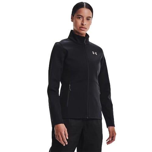 A person wears a black Under Armour jacket with a full zip and stand collar, featuring the brand's logo on the chest.