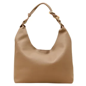 Beige leather hobo bag with a slouchy design, featuring a knotted handle and gold-tone buckle detail.