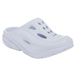 A white slip-on recovery mule with ventilation holes and a thick, cushioned sole for comfort and support. Designed for maximum breathability and post-activity recovery.