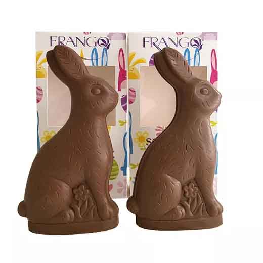 Frango 2k Solid Milk Chocolate Bunnies are packaged in decorative boxes with colorful patterns. Each bunny is intricately detailed, showcasing a classic rabbit shape.