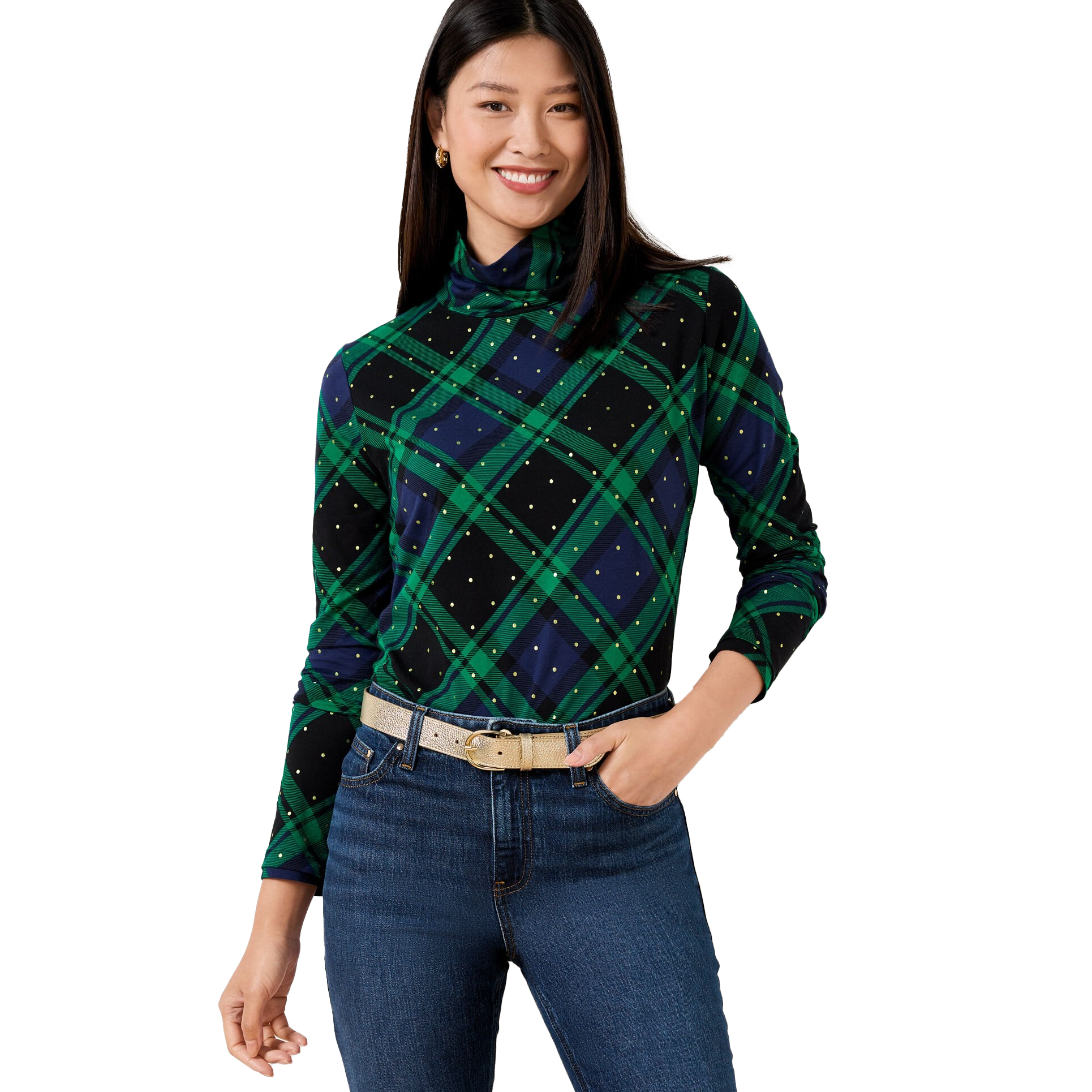 A woman wearing a Talbots plaid turtleneck with a green, blue, and black pattern featuring small dot accents. She pairs it with dark blue jeans and a light beige belt.