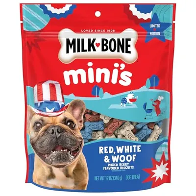 Milk-Bone Mini's Red, White & Woof mixed berry flavored dog biscuits, limited edition, 12 oz (340 g). Packaging features a dog wearing a patriotic hat.