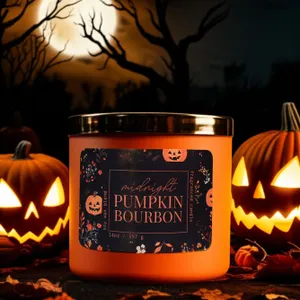 A \“Midnight Pumpkin Bourbon\“ scented candle sits among jack-o'-lanterns under a full moon, capturing a spooky Halloween ambiance.