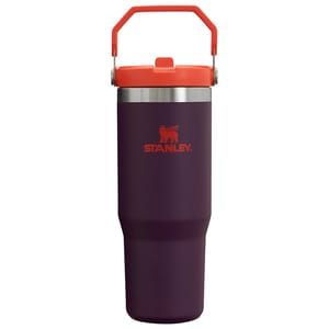 Stanley IceFlow Tumbler, 30oz, features a dark purple body with a red lid and handle, and the Stanley logo in red. Designed for durability and portability.