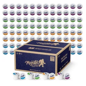 Majestic Blends coffee pods in various flavors are displayed, featuring a large box labeled \“100 pods\“ and several pods shown in the foreground.