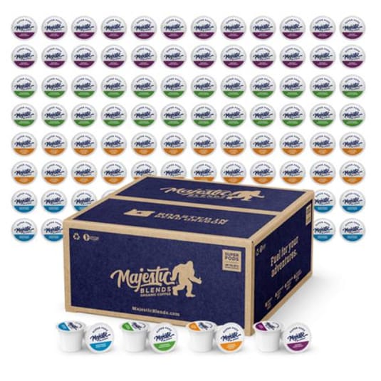 Majestic Blends coffee pods in various flavors are displayed, featuring a large box labeled \“100 pods\“ and several pods shown in the foreground.