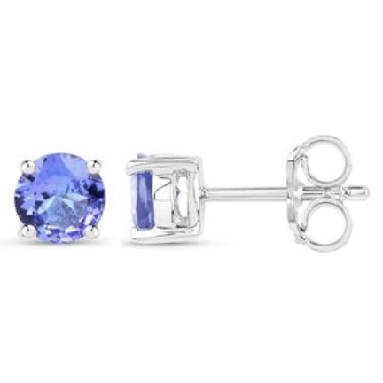 Round-cut tanzanite stud earrings set in a four-prong sterling silver mount with a simple post and butterfly backing. The tanzanites exhibit a deep blue-purple hue.