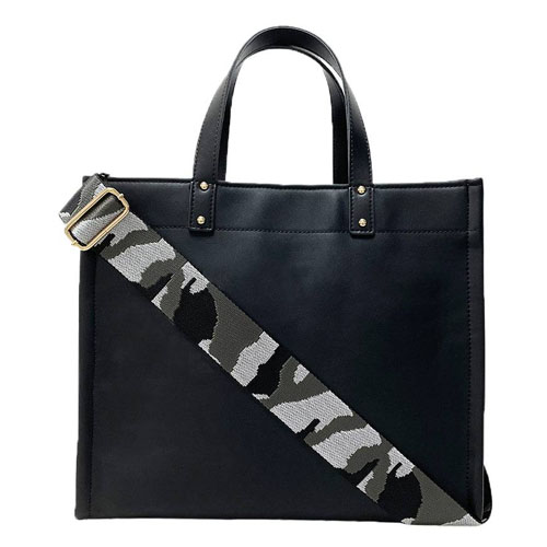 Black tote bag with short handles and a detachable shoulder strap featuring a black, white, and grey camouflage pattern.