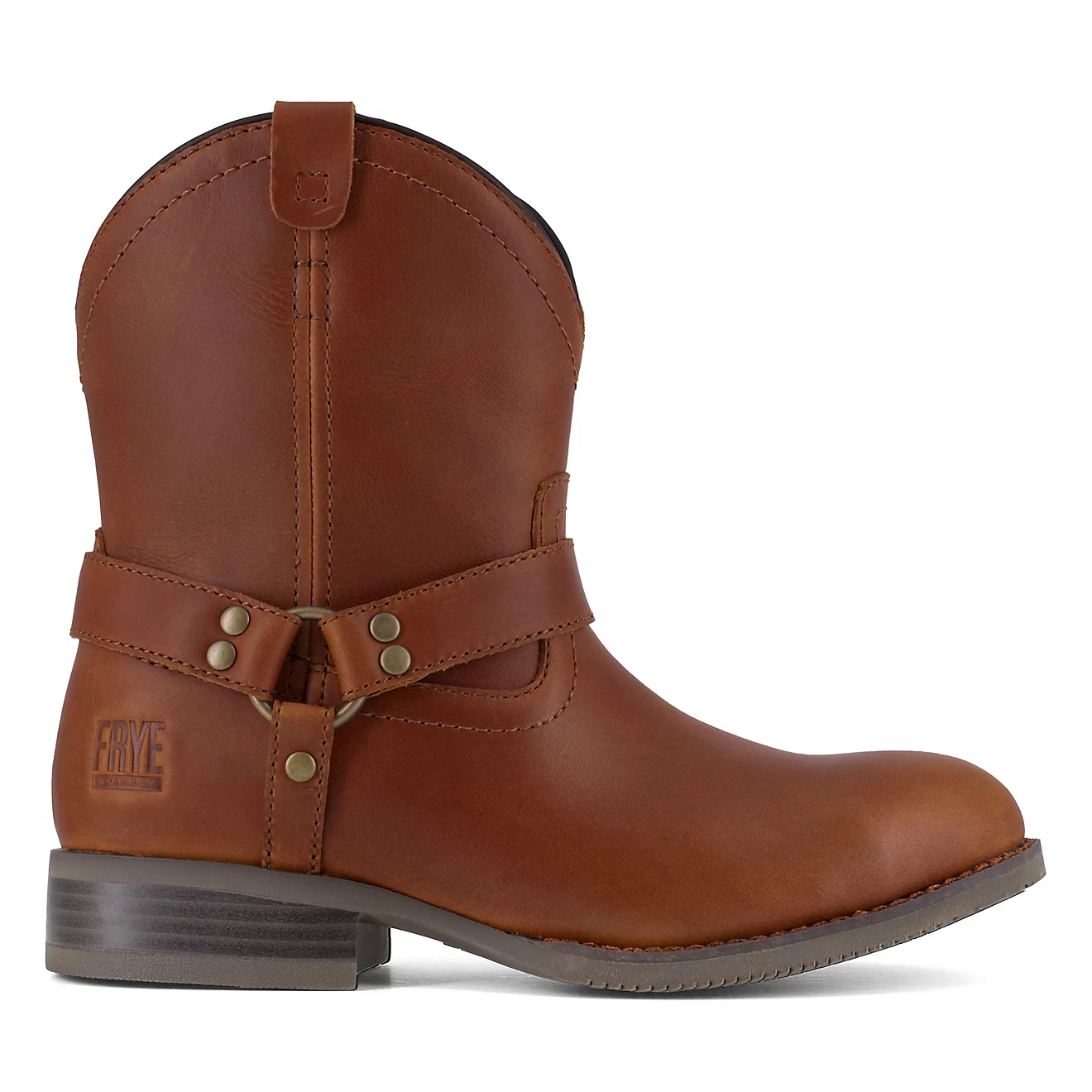 Brown mid-calf leather boot with a harness strap and metal rivets, featuring a low stacked heel and Frye branding.