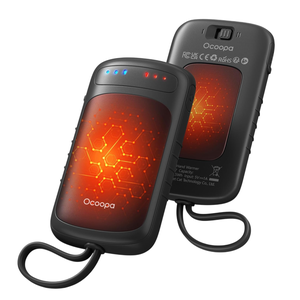 Rechargeable hand warmers with a textured design, LED indicators, and rubberized edges, branded \“Ocoopa\“.