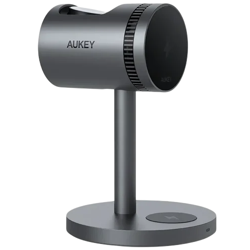 A sleek AUKEY wireless charging stand with a cylindrical design on a vertical support and circular base, featuring a wireless charging symbol on the base.