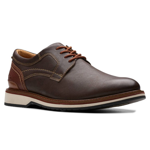 Brown leather Oxford shoes with a classic design, featuring contrast stitching, lace-up closure, and a two-tone sole with a cushioned interior, suitable for formal or casual wear.
