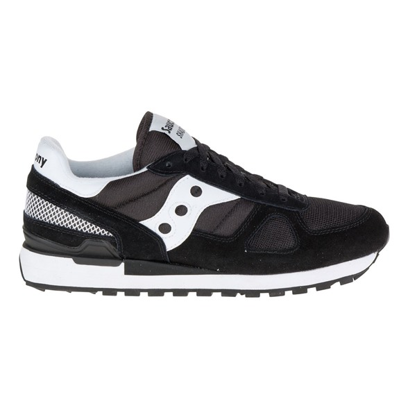 Black and white athletic sneaker with a mesh and suede design, featuring a distinctive \“S\“ logo on the side and a waffle-patterned sole for grip.