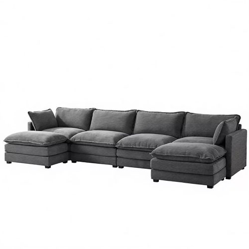 A gray sectional sofa with multiple cushions, featuring a chaise on each end for added seating and comfort.