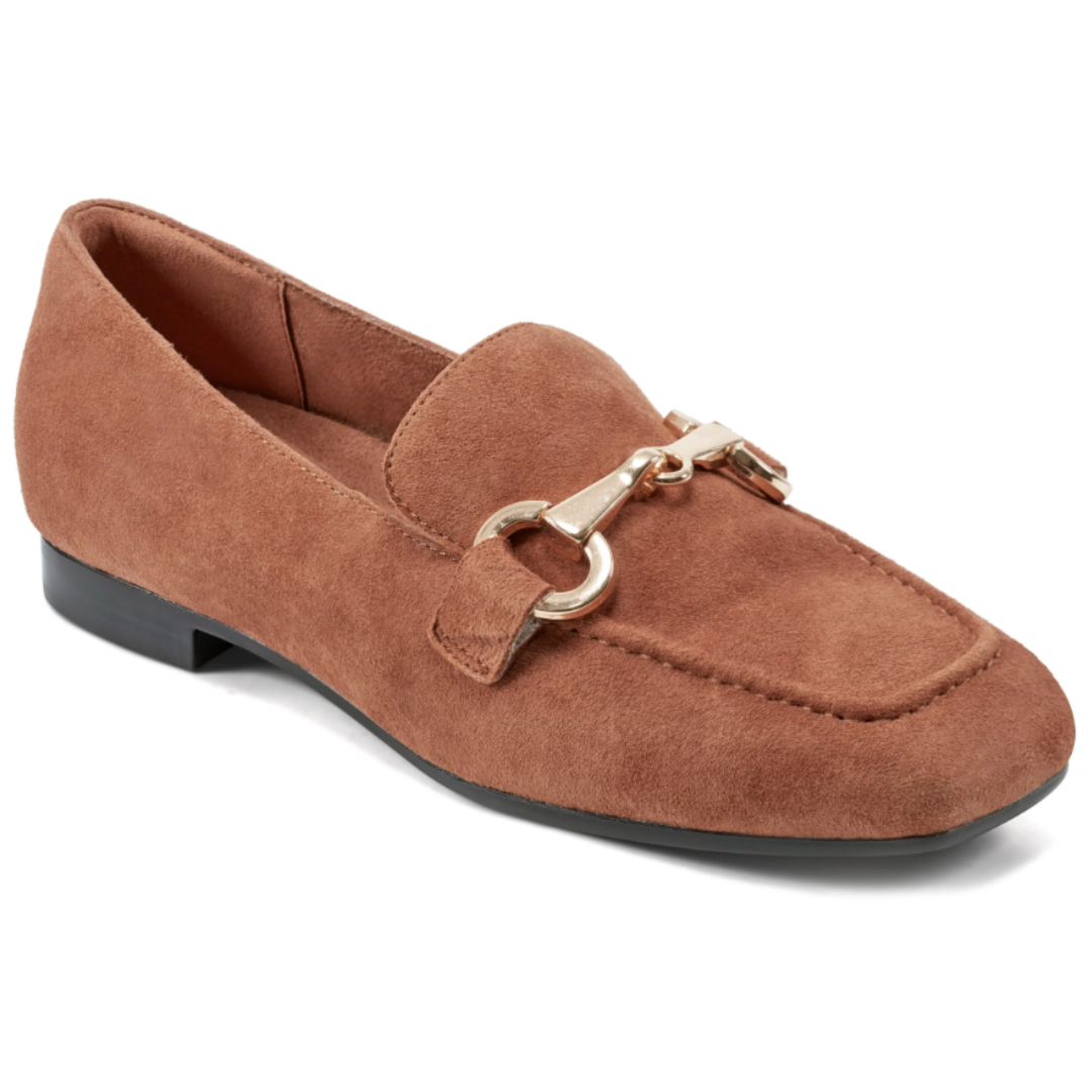 Brown suede loafer with a gold horsebit detail and a low black heel.