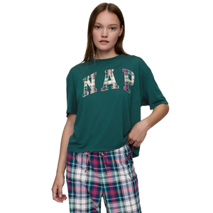 Green short-sleeve graphic tee with \“NAP\“ in plaid-patterned letters on the front, paired with multicolored plaid pajama pants.