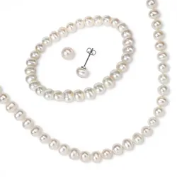 A set of white pearl jewelry including a necklace and matching stud earrings.