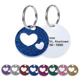 Round pet ID tags with heart cutouts in various glitter colors, each featuring a customizable backside for personal information.