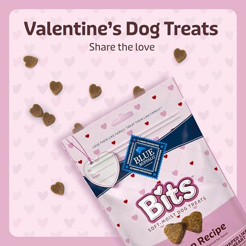 Valentine's Day-themed dog treats, \“Bits,\“ by Blue Buffalo, in heart shapes. The packaging features a pink design with the message \“Share the love.\“