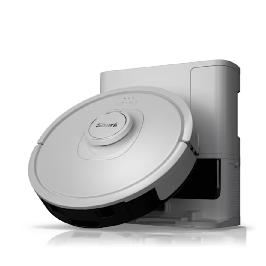 A Shark branded round robotic vacuum is shown docked at its charging station, featuring a white and black design.