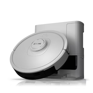A Shark branded round robotic vacuum is shown docked at its charging station, featuring a white and black design.