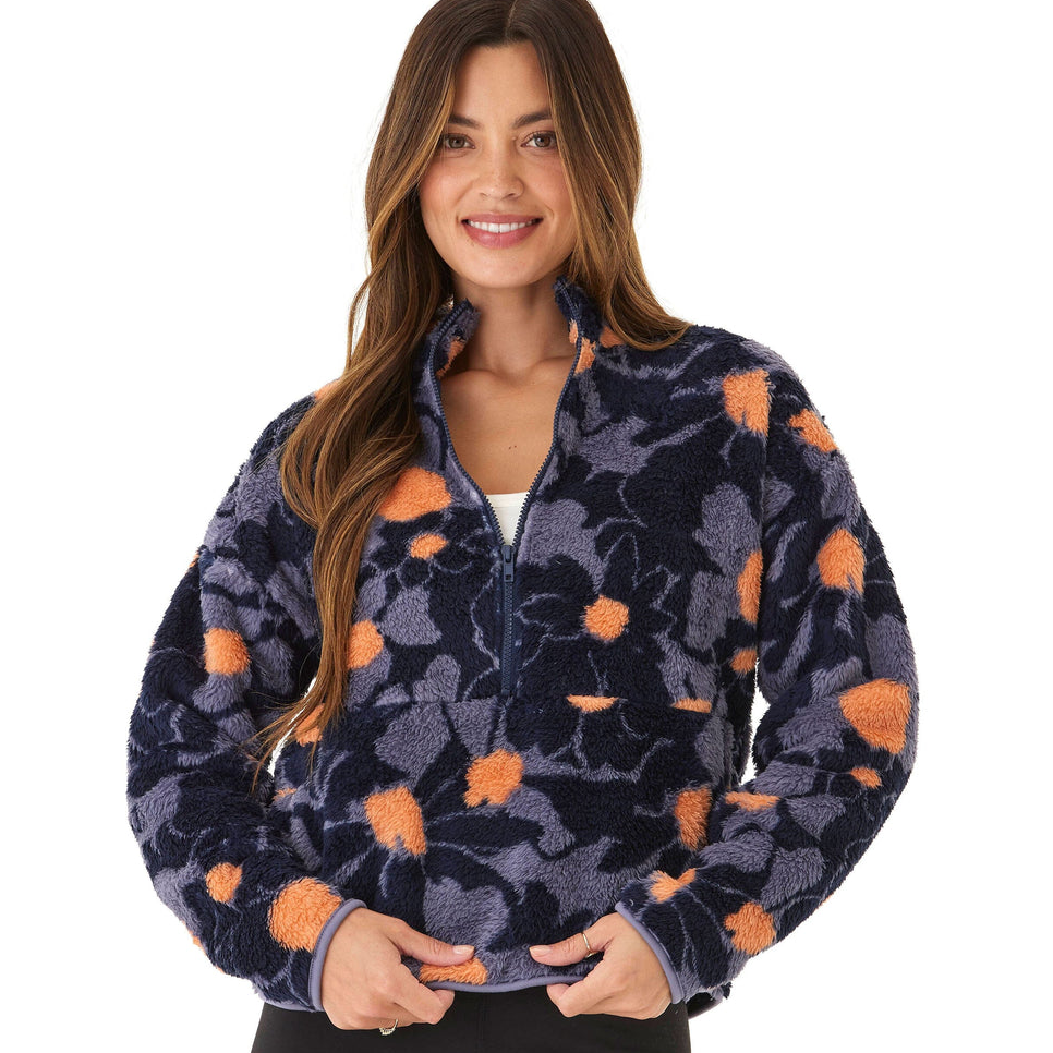 A cozy Threads 4 Thought Sherpa pullover featuring a navy and orange abstract floral pattern, half-zip design, and kangaroo pocket.