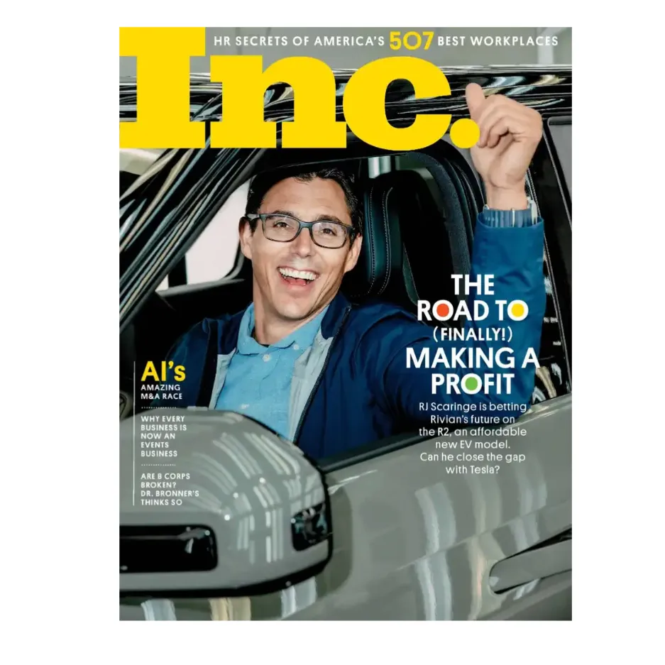Magazine cover featuring the headline about Rivian and its CEO, RJ Scaringe, discussing profitability and competition with Tesla. Other topics include AI’s role in mergers and acquisitions and insights into modern business challenges.