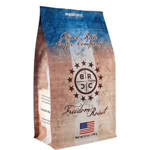 Black Rifle Coffee Company Freedom Roast, 12 oz (340 g), featuring patriotic-themed packaging with an American flag.
