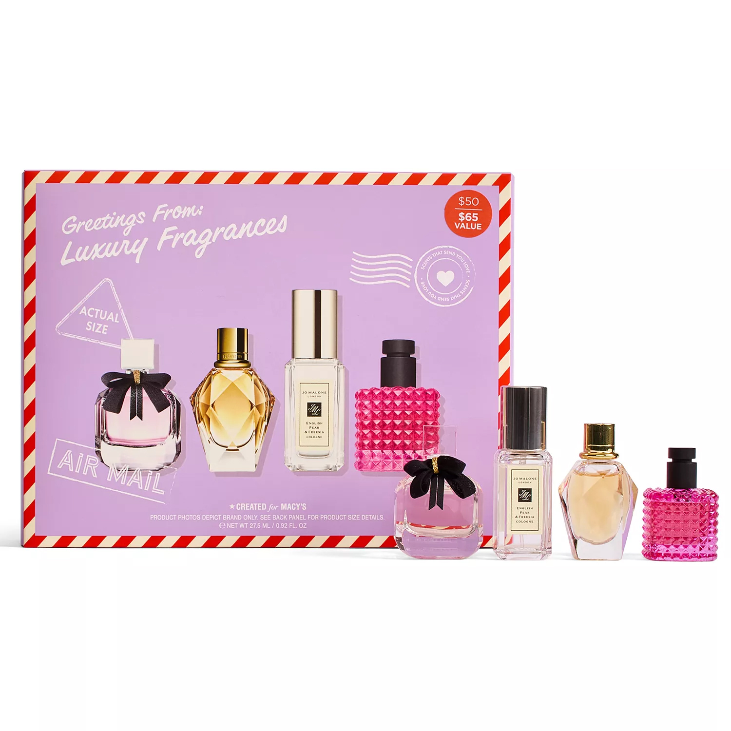 Fragrance gift set featuring four mini luxury perfumes displayed in front of packaging labeled \“Greetings From: Luxury Fragrances\“ with a $50 price tag and $65 value.