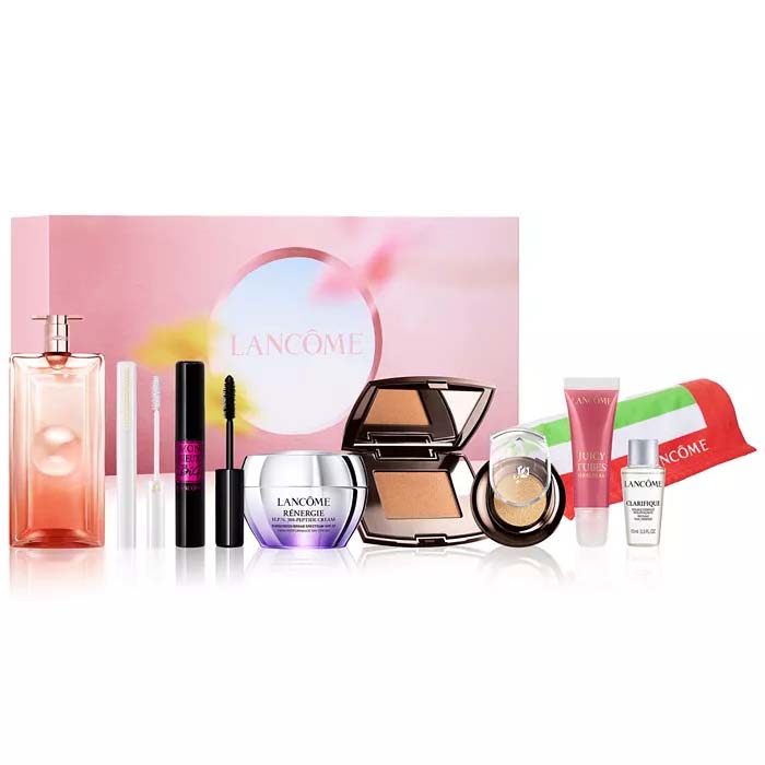 Lancôme set with perfume, mascara, skincare, and makeup products, including Rénergie cream, bronzer, Juicy Tubes lip gloss, Clarifique serum, and a cosmetic pouch.