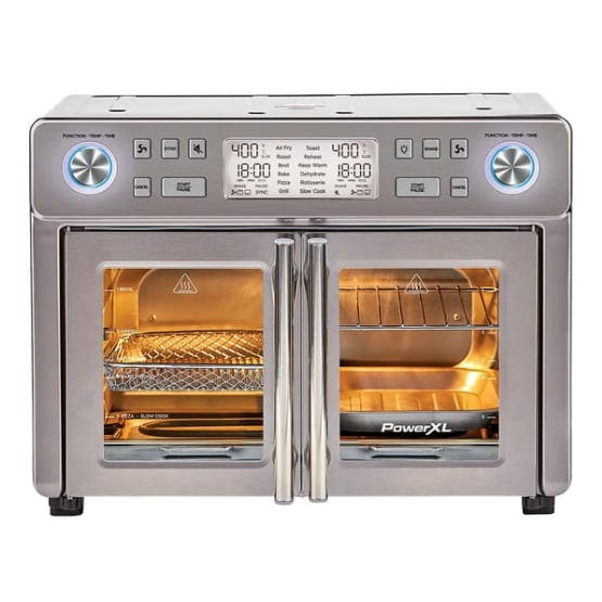 PowerXL 25qt Air Fryer Oven features a stainless steel design with French doors, digital display, and various cooking functions including air fry and toast. The interior has multiple racks for versatile cooking options.