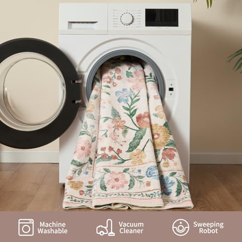 A floral-patterned rug is partially placed in a washing machine, indicating it's machine washable. Below are icons suggesting it can also be cleaned using a vacuum cleaner and a sweeping robot.
